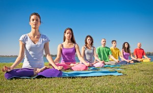 Group of young people have meditation on yoga class. Yoga concep